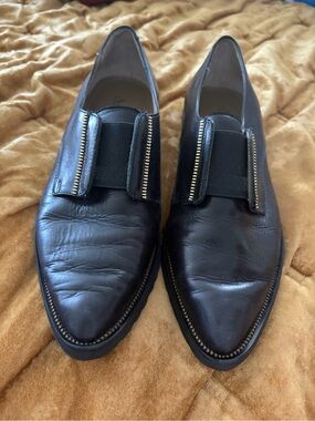 Women’s Black Leather Slip-On Dress Shoes with Gold Trim